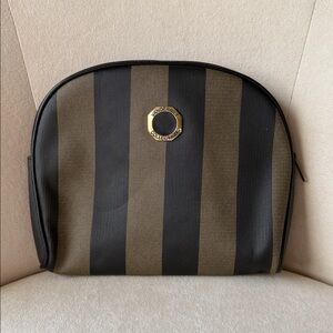 Black and Brown Striped Pouch by Vanderbilt Collection